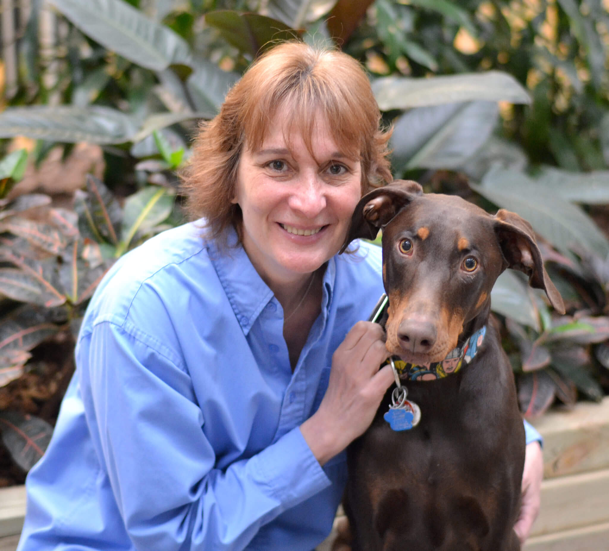 Senior Director of Operations CJ Bentley and her adopted dog, Rogue