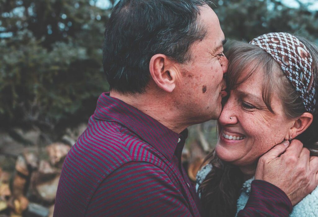 Older couple showing affection.